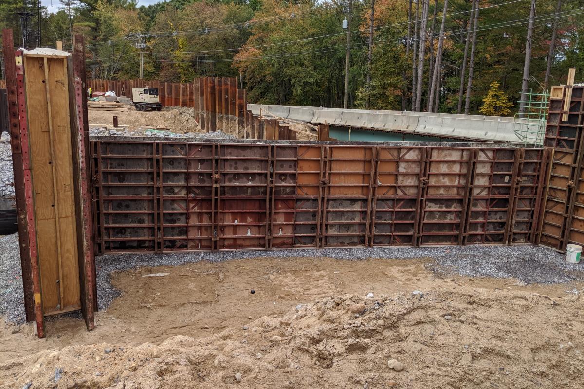 BRIDGE ABUTMENTS BEING FORMED