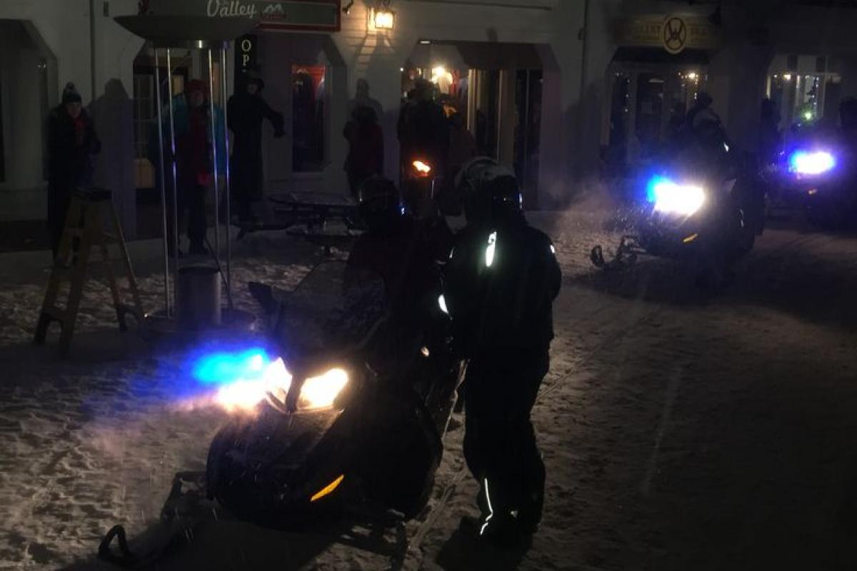 The Torch arrives by Snowmobile